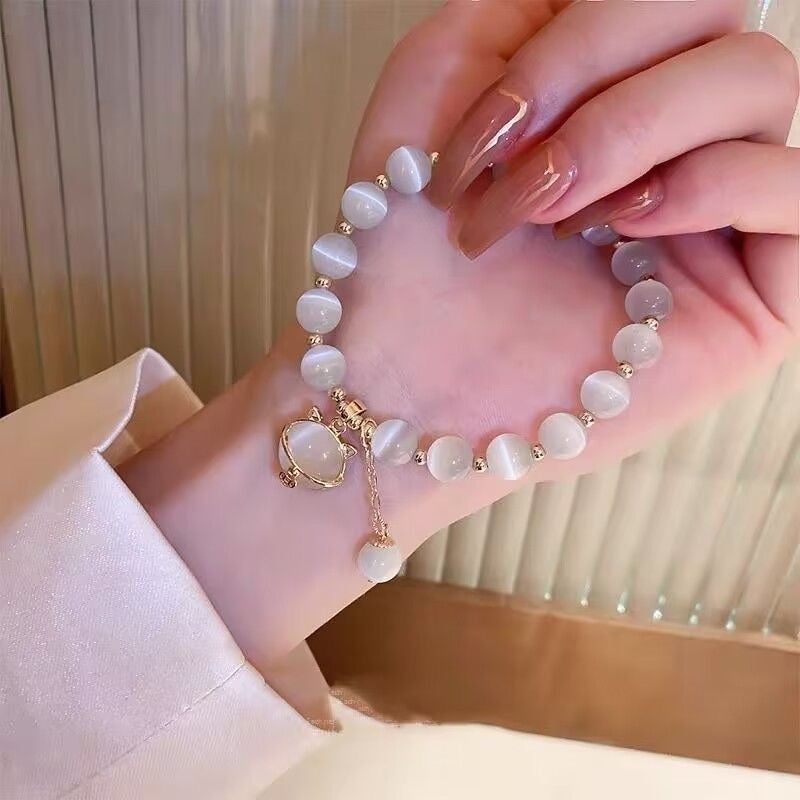 White Cat Eye Stone Bracelet — Lucky Cat Charm