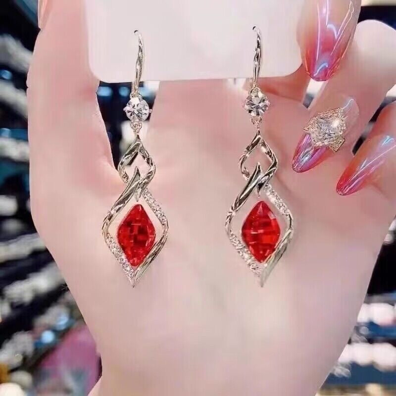 Red Crystal Twisted Geometric Drop Earrings — Gold Tone with Crystal Accent